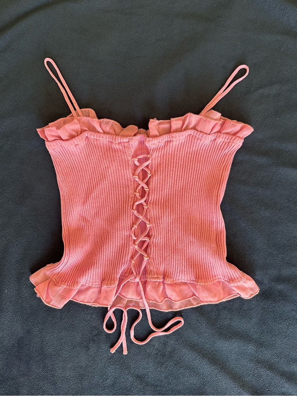 Pink Top With Frilled Edges and Lace-Up Detail